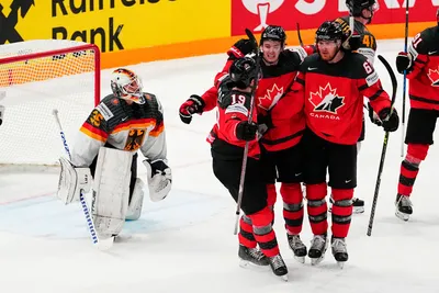 Canada's Lawson Crouse (67) celebrates his goal on Germany's goalie Mathias Niederberger (35) during the gold medal match at the Ice Hockey World Championship in Tampere, Finland, Sunday, May 28, 2023. (AP Photo/Pavel Golovkin)