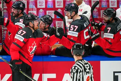 Canada's Lawson Crouse (67) celebrates his goal with teammates during the gold medal match against Germany at the Ice Hockey World Championship in Tampere, Finland, Sunday, May 28, 2023. (AP Photo/Pavel Golovkin)
