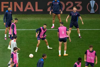 Sevilla players warm up during a training session at the Puskas Arena in Budapest, Hungary, Tuesday, May 30, 2023. The Europa League final match between Sevilla FC and AS Roma is held in Budapest on May 31, 2023. (AP Photo/Darko Vojinovic)

- XEUROPALEAGUEX