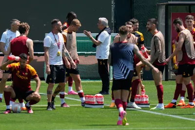 Roma's head coach Jose Mourinho, center, talks with players during a training session ahead of the Europa League soccer final, at the Trigoria training centre, in Rome, Tuesday, May 30, 2023. Roma will play an Europa League final against Sevilla in Budapest, Hungary, next Wednesday, May 31. (AP Photo/Alessandra Tarantino)

- xeuropaleaguex