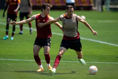 Roma's Edoardo Bove, left, and Roma's Nemanja Matic vie for the ball during a training session ahead of the Europa League soccer final, at the Trigoria training centre, in Rome, Tuesday, May 30, 2023. Roma will play an Europa League final against Sevilla in Budapest, Hungary, next Wednesday, May 31. (AP Photo/Alessandra Tarantino)

- xeuropaleaguex