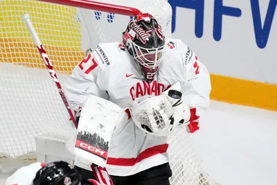 Goalie Devon Levi of Canada in action during the group B match between Slovenia and Canada at the ice hockey world championship in Riga, Latvia, Sunday, May 14, 2023. (AP Photo/Roman Koksarov)