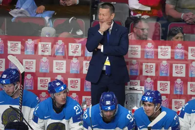Head coach of Kazakhstan Galym Mambetaliev reacts during the group B match between Czech Republic and Kazakhstan at the ice hockey world championship in Riga, Latvia, Sunday, May 14, 2023. (AP Photo/Roman Koksarov)