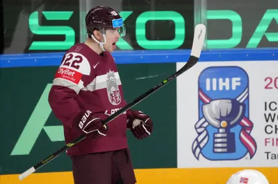 Toms Andersons of Latvia celebrates a goal during the group B match between Latvia and Norway at the ice hockey world championship in Riga, Latvia, Wednesday, May 17, 2023. (AP Photo/Roman Koksarov)