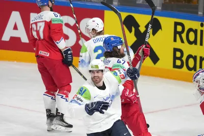 Miha Verlic of Slovenia celebrates during the group B match between Czech Republic and Slovenia at the ice hockey world championship in Riga, Latvia, Thursday, May 18, 2023. (AP Photo/Roman Koksarov)