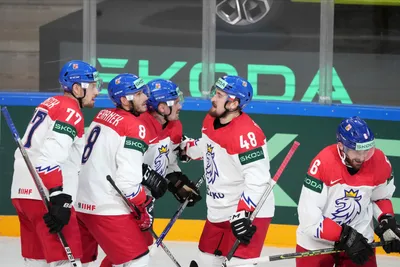 Team Czech Republic players celebrate during the group B match between Norway and Czech Republic at the ice hockey world championship in Riga, Latvia, Saturday, May 20, 2023. (AP Photo/Roman Koksarov)