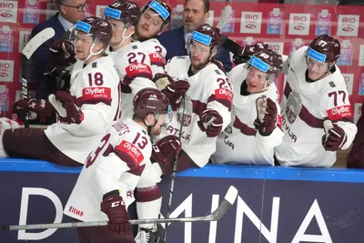 Rihards Bukarts of Latvia celebrates a goal during the group B match between Kazakhstan and Latvia at the ice hockey world championship in Riga, Latvia, Saturday, May 20, 2023. (AP Photo/Roman Koksarov)