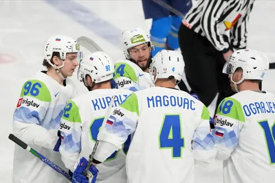 Team Slovenia players celebrate a goal during the group B match between Kazakhstan and Slovenia at the ice hockey world championship in Riga, Latvia, Monday, May 22, 2023. (AP Photo/Roman Koksarov)