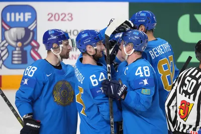Team Kazakhstan players celebrate a goal during the group B match between Kazakhstan and Slovenia at the ice hockey world championship in Riga, Latvia, Monday, May 22, 2023. (AP Photo/Roman Koksarov)