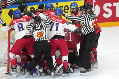 Team Canada players battle with team Czech Republic players during the group B match between Canada and Czech Republic at the ice hockey world championship in Riga, Latvia, Tuesday, May 23, 2023. (AP Photo/Roman Koksarov)