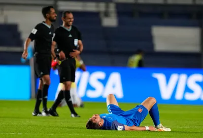 Slovakia's Sebastian Kosa lies on the pitch after their 2-1 defeat to Ecuador during a FIFA U-20 World Cup Group B soccer match at San Juan stadium in San Juan, Argentina, Tuesday, May 23, 2023. (AP Photo/Natacha Pisarenko)