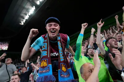 West Ham supporters celebrate at the end of the Europa Conference League final soccer match between Fiorentina and West Ham at the Eden Arena in Prague, Wednesday, June 7, 2023. (AP Photo/Darko Bandic)

- XCONFERENCELEAGUEX