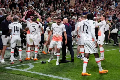 West Ham players celebrate at the end of the Europa Conference League final soccer match between Fiorentina and West Ham at the Eden Arena in Prague, Wednesday, June 7, 2023. (AP Photo/Darko Bandic)

- XCONFERENCELEAGUEX