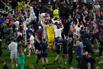 West Ham goalkeeper Alphonse Areola celebrates at the end of the Europa Conference League final soccer match between Fiorentina and West Ham at the Eden Arena in Prague, Wednesday, June 7, 2023. (AP Photo/Darko Vojinovic)

- XCONFERENCELEAGUEX