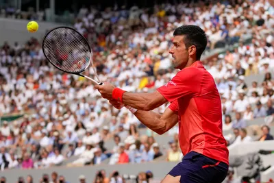 Serbia's Novak Djokovic plays a shot against Norway's Casper Ruud during the men's singles final match of the French Open tennis tournament at the Roland Garros stadium in Paris, Sunday, June 11, 2023. (AP Photo/Christophe Ena)