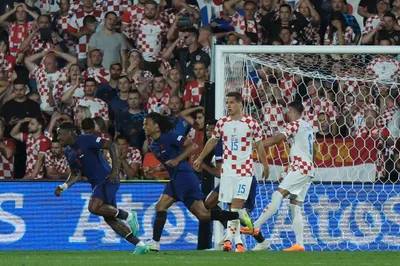 Netherland players celebrate the second goal from their teammate Noa Lang after scoring against Croatia during the Nations League semifinal soccer match between the Netherlands and Croatia at De Kuip stadium in Rotterdam, Netherlands, Wednesday, June 14, 2023. (AP Photo/Patrick Post)