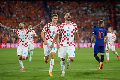 Croatia's Bruno Petkovic celebrates after scoring his side's third goal during the Nations League semifinal soccer match between the Netherlands and Croatia at De Kuip stadium in Rotterdam, Netherlands, Wednesday, June 14, 2023. (AP Photo/Peter Dejong)