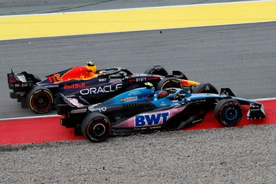 Red Bull driver Sergio Perez of Mexico , rear, overtakes Alpine driver Pierre Gasly of France during the Spanish Formula One Grand Prix at the Barcelona Catalunya racetrack in Montmelo, Spain, Sunday, June 4, 2023. (AP Photo/Joan Monfort)

- f1autoz23