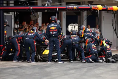 Mechanics work on the car of Red Bull driver Sergio Perez of Mexico in the pitlane during the Spanish Formula One Grand Prix at the Barcelona Catalunya racetrack in Montmelo, Spain, Sunday, June 4, 2023. (Albert Gea/Pool Photo via AP)

- f1autoz23