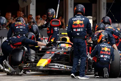 Mechanics work on the car of Red Bull driver Sergio Perez of Mexico in the pitlane during the Spanish Formula One Grand Prix at the Barcelona Catalunya racetrack in Montmelo, Spain, Sunday, June 4, 2023. (Albert Gea/Pool Photo via AP)

- f1autoz23