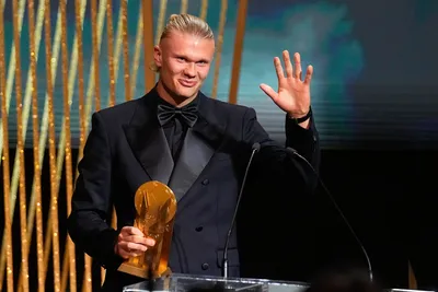 Manchester City's Erling Haaland celebrates after receiving the Gerd MĂĽller trophy during the 67th Ballon d'Or (Golden Ball) award ceremony at Theatre du Chatelet in Paris, France, Monday, Oct. 30, 2023. (AP Photo/Michel Euler)