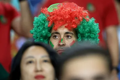 Portugal supporters on the stands wait for the start of the Euro 2024 group J qualifying soccer match between Portugal and Slovakia at the Dragao stadium in Porto, Portugal, Friday, Oct. 13, 2023. (AP Photo/Luis Vieira)

- XEURO2024X