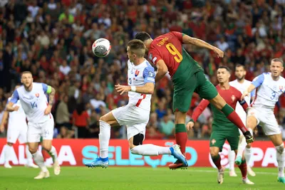 Portugal's Goncalo Ramos, center right, scores the opening goal during the Euro 2024 group J qualifying soccer match between Portugal and Slovakia at the Dragao stadium in Porto, Portugal, Friday, Oct. 13, 2023. (AP Photo/Luis Vieira)

- XEURO2024X