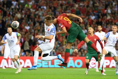 Portugal's Goncalo Ramos, center right, scores the opening goal during the Euro 2024 group J qualifying soccer match between Portugal and Slovakia at the Dragao stadium in Porto, Portugal, Friday, Oct. 13, 2023. (AP Photo/Luis Vieira)

- XEURO2024X