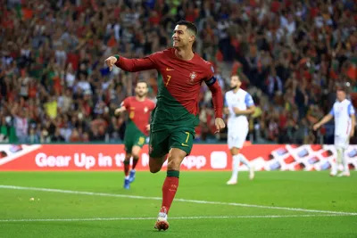 Portugal's Cristiano Ronaldo celebrates after scoring his side's second goal from the penalty spot during the Euro 2024 group J qualifying soccer match between Portugal and Slovakia at the Dragao stadium in Porto, Portugal, Friday, Oct. 13, 2023. (AP Photo/Luis Vieira)

- XEURO2024X