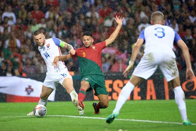 Portugal's Goncalo Ramos vies for the ball with Slovakia's Milan Skriniar, left, during the Euro 2024 group J qualifying soccer match between Portugal and Slovakia at the Dragao stadium in Porto, Portugal, Friday, Oct. 13, 2023. (AP Photo/Luis Vieira)

- XEURO2024X