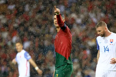 Portugal's Cristiano Ronaldo gestures during the Euro 2024 group J qualifying soccer match between Portugal and Slovakia at the Dragao stadium in Porto, Portugal, Friday, Oct. 13, 2023. (AP Photo/Luis Vieira)

- XEURO2024X