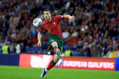 Portugal's Diogo Jota eyes the ball during the Euro 2024 group J qualifying soccer match between Portugal and Slovakia at the Dragao stadium in Porto, Portugal, Friday, Oct. 13, 2023. (AP Photo/Luis Vieira)

- XEURO2024X
