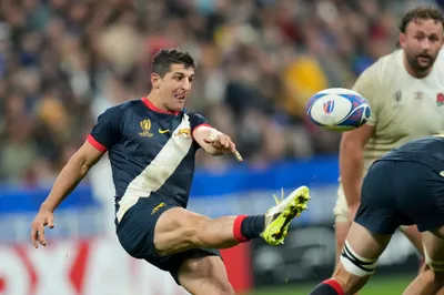 Argentina's Tomas Cubelli kicks the ball during the Rugby World Cup third place match between England and Argentina at the Stade de France in Saint-Denis, outside Paris, Friday, Oct. 27, 2023. (AP Photo/Themba Hadebe)