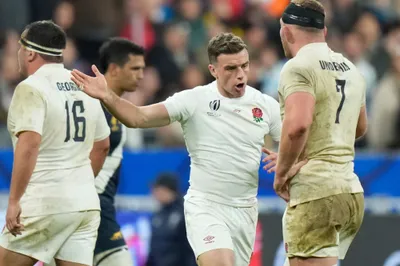 England's George Ford, center, reacts during the Rugby World Cup third place match between England and Argentina at the Stade de France in Saint-Denis, outside Paris, Friday, Oct. 27, 2023. (AP Photo/Pavel Golovkin)