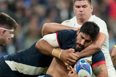 Argentina's Rodrigo Bruni is tackled by England's Owen Farrell during the Rugby World Cup third place match between England and Argentina at the Stade de France in Saint-Denis, outside Paris, Friday, Oct. 27, 2023. (AP Photo/Themba Hadebe)