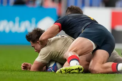 England's Theo Dan scores a try during the Rugby World Cup third place match between England and Argentina at the Stade de France in Saint-Denis, outside Paris, Friday, Oct. 27, 2023. (AP Photo/Themba Hadebe)