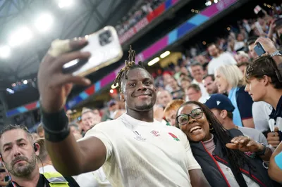 England's Maro Itoje celebrates after his team won the Rugby World Cup quarterfinal match between England and Fiji at the Stade de Marseille in Marseille, France, Sunday, Oct. 15, 2023. (AP Photo/Laurent Cipriani)