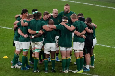 The South African team huddle as they warm up ahead of the Rugby World Cup semifinal match between England and South Africa at the Stade de France in Saint-Denis, outside Paris, Saturday, 21, 2023. (AP Photo/Themba Hadebe)