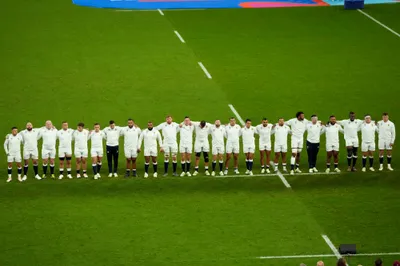 The England team line up just before kick off during the Rugby World Cup semifinal match between England and South Africa at the Stade de France in Saint-Denis, outside Paris, Saturday, Oct, 21, 2023. (AP Photo/Themba Hadebe)