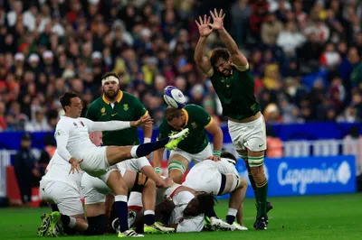 England's Alex Mitchell kicks the ball during the Rugby World Cup semifinal match between England and South Africa at the Stade de France in Saint-Denis, near Paris, Saturday, Oct. 21, 2023. (AP Photo/Aurelien Morissard)