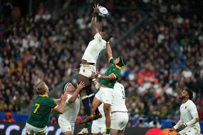 England's Maro Itoje reaches for the ball during the Rugby World Cup semifinal match between England and South Africa at the Stade de France in Saint-Denis, outside Paris, Saturday, Oct. 21, 2023. (AP Photo/Pavel Golovkin)