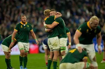 South Africa players celebrate at the end of the Rugby World Cup quarterfinal match between France and South Africa at the Stade de France in Saint-Denis, near Paris Sunday, Oct. 15, 2023. South Africa won the match 29-28. (AP Photo/Thibault Camus)