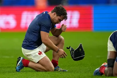 France's Antoine Dupont reacts after the end of the Rugby World Cup quarterfinal match between France and South Africa at the Stade de France in Saint-Denis, near Paris Sunday, Oct. 15, 2023. South Africa won the match 29-28. (AP Photo/Thibault Camus)