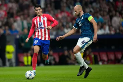 Atletico Madrid's Alvaro Morata and Feyenoord's Gernot Trauner go for the ball during the Champions League Group E soccer match between Atletico Madrid and Feyenoord at the Metropolitano stadium in Madrid, Spain, Wednesday, Oct. 4, 2023. (AP Photo/Bernat Armangue)

- XCHAMPIONSLEAGUEX