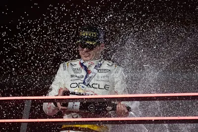 Red Bull driver Max Verstappen, of the Netherlands, sprays champagne on the podium after winning the Formula One Las Vegas Grand Prix auto race, Saturday, Nov. 18, 2023, in Las Vegas. (AP Photo/Darron Cummings)