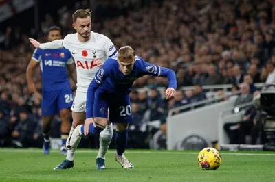 Chelsea's Cole Palmer, right, challenges for the ball with Tottenham's James Maddison during the English Premier League soccer match between Tottenham Hotspur and Chelsea, at Tottenham Hotspur Stadium, London, Monday, Nov. 6, 2023. (AP Photo/David Cliff)

- XPREMIERLEAGUEX