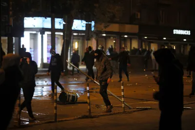 Bulgarian supporters clash with police during the Euro 2024 Bulgaria v Hungary soccer match, played at closed doors, in Sofia, Thursday, Nov. 16, 2023. Thousands of Bulgarian football supporters have taken to the streets of the capital, Sofia, in protest over the management of the national football union, a demonstration that eventually turned violent. The European soccer qualifier between Bulgaria and Hungary fell victim to a bitter dispute between the management of the Bulgarian Football Union and soccer fans from across the Balkan country. (AP Photo/Valentina Petrova)
- xeuro2024x