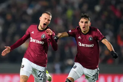 Sparta's Lukas Haraslin, left, celebrates with Sparta's Qazim Laci after scoring his sides first goal during the Europa League group C soccer match between Sparta Prague and Betis at the Epet Arena in Prague, Czech Republic, Thursday, Nov. 30, 2023. (AP Photo/Petr David Josek)

- XEUROPALEAGUEX