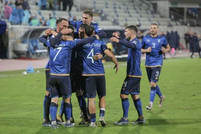 Kosovo's players celebrate the opening goal during the Euro 2024 group I qualifying soccer match between Kosovo and Israel at the Fadil Vokrri stadium in Pristina, Kosovo, Sunday, Nov. 12, 2023. (AP Photo/Visar Kryeziu)

- XEURO2024X