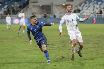 Kosovo's Milot Rashica, left, celebrates after scoring the opening goal during the Euro 2024 group I qualifying soccer match between Kosovo and Israel at the Fadil Vokrri stadium in Pristina, Kosovo, Sunday, Nov. 12, 2023. (AP Photo/Visar Kryeziu)

- XEURO2024X